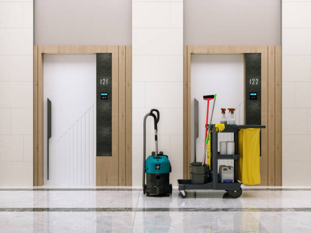 Janitorial crew vacuuming carpets and maintaining commercial space