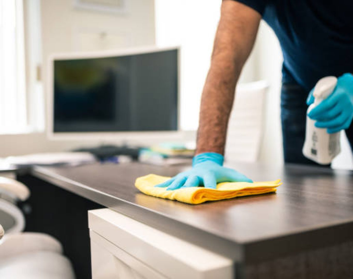 Professional janitorial staff providing licensed office cleaning by T & M Services INC.
