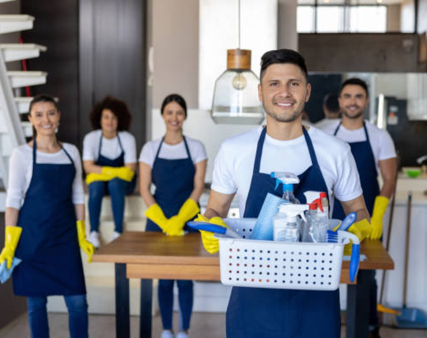 Professional cleaners disinfecting high touch areas in commercial buildings