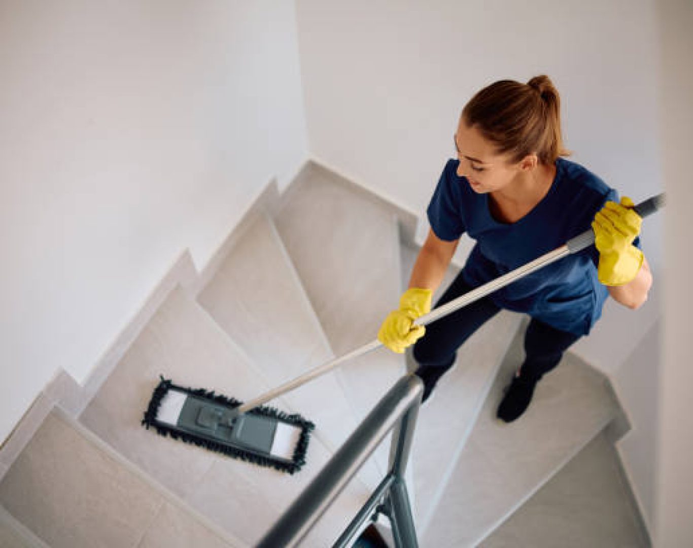 Janitorial cleaning crew sanitizing offices and commercial workspaces thoroughly