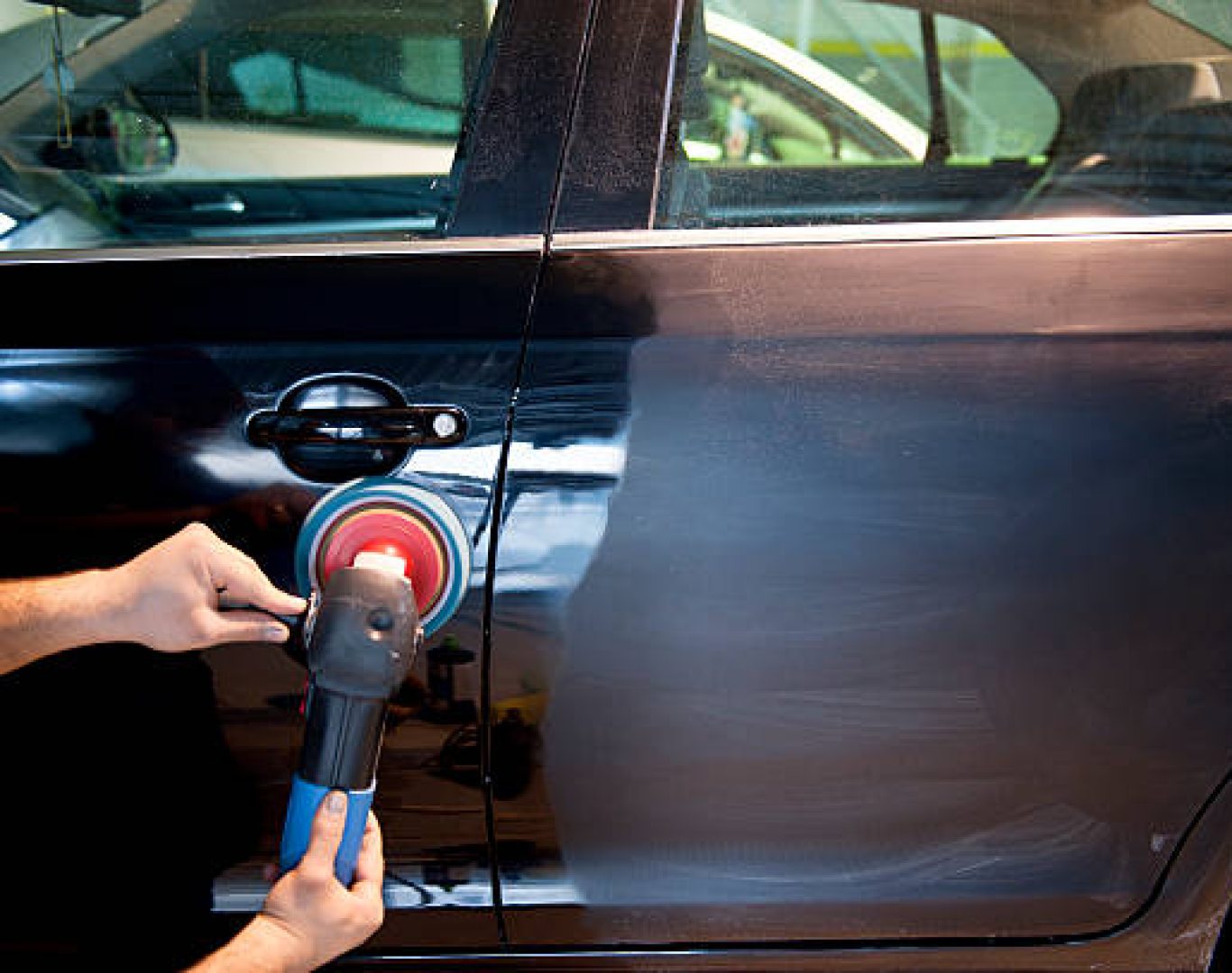 Dealership cleaning professionals maintaining service bay cleanliness
